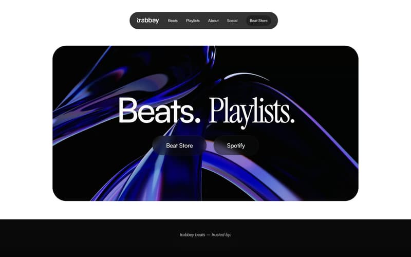 trabbey.com home page on a laptop: a dark rounded hero with the words Beats. Playlists.